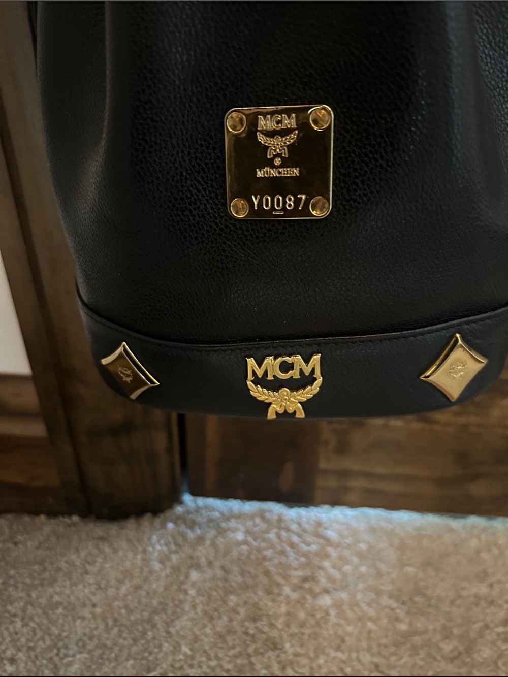MCM Black Leather Mini Drawstring Bucket Bag with Gold Accents - Picture 3 of 14